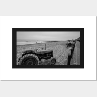 Tractor on Cromer beach on the North Norfolk coast Posters and Art